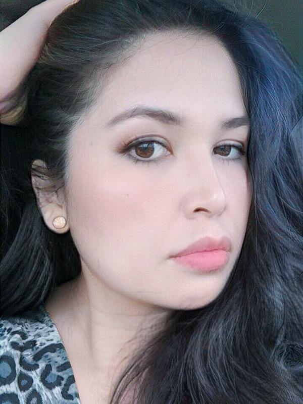 women wearing ROUND LEMON DROP EARRINGS