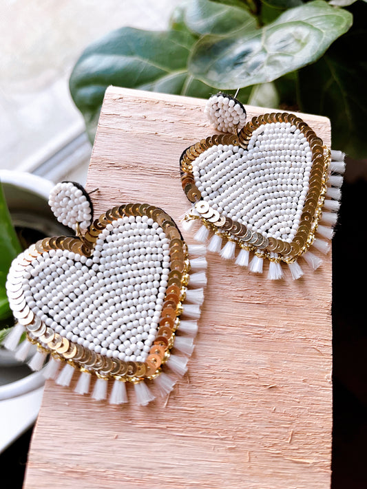 white and gold heart earring